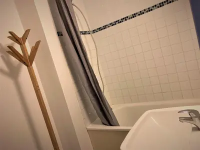 Salle de bains dans l'établissement Appartement double à Limoges