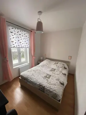 Un ou plusieurs lits dans un hébergement de l'établissement Appartement F1