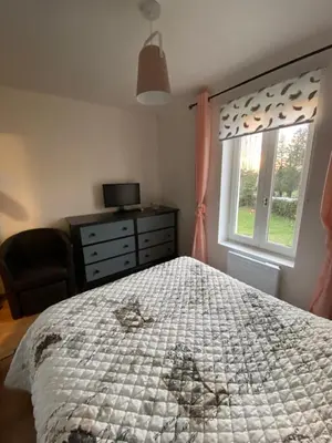 Un ou plusieurs lits dans un hébergement de l'établissement Appartement F1