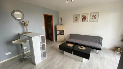 Coin salon dans l'établissement Joli petit appartement sur les hauteurs de BRIVE