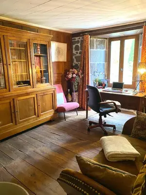 Coin salon dans l'établissement Chambre avec du charme