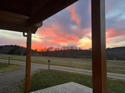 Lever ou coucher de soleil vu de la maison de vacances ou à proximité