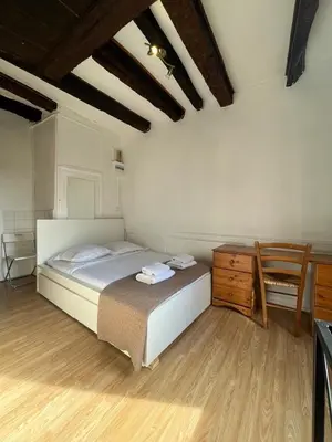 Un ou plusieurs lits dans un hébergement de l'établissement Duplex Rue Huchette - DABNB