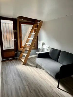 Coin salon dans l'établissement Duplex Rue Huchette - DABNB