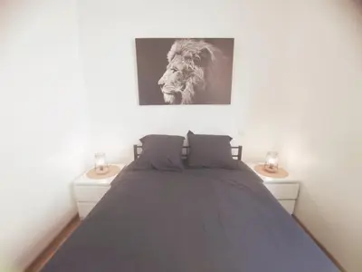 Un ou plusieurs lits dans un hébergement de l'établissement AppartementCosy, cœurdeSouillac tidordognehomes