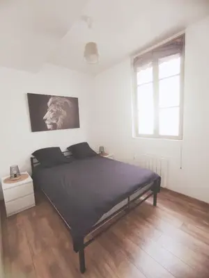 Un ou plusieurs lits dans un hébergement de l'établissement AppartementCosy, cœurdeSouillac tidordognehomes