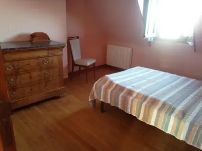 Un ou plusieurs lits dans un hébergement de l'établissement Maison récente type traditionnelle 9 couchages