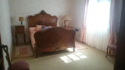 Un ou plusieurs lits dans un hébergement de l'établissement Maison récente type traditionnelle 9 couchages