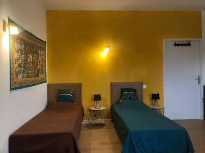 Un ou plusieurs lits dans un hébergement de l'établissement Écolodge Entre Nature & Silence Au Coeur du Quercy