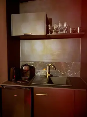 Cuisine ou kitchenette dans l'établissement Suite Interdite - Love Room - Les Suites Gaillardes