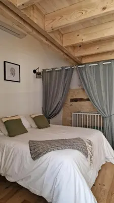 Un ou plusieurs lits dans un hébergement de l'établissement La Grange Périgord - Sarlat - Piscine privée