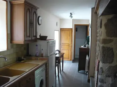 Cuisine ou kitchenette dans l'établissement la maison de Voueize