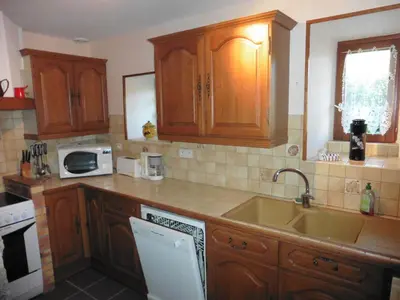 Cuisine ou kitchenette dans l'établissement la maison de Voueize
