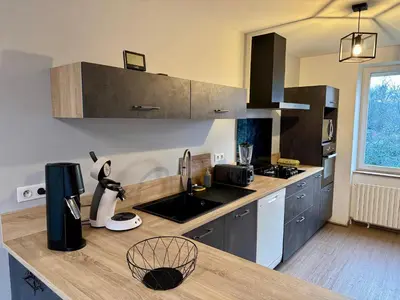 Cuisine ou kitchenette dans l'établissement Maison individuelle à deux pas du château de Pompadour et de l'hippodrome !