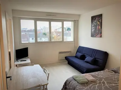 Télévision ou salle de divertissement dans l'établissement Appartement double à Limoges