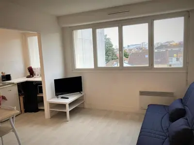 Télévision ou salle de divertissement dans l'établissement Appartement double à Limoges