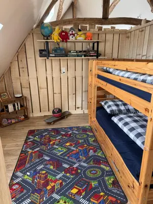 Un ou plusieurs lits dans un hébergement de l'établissement La Bel'Chéri, belle maison de caractère en Dordogne