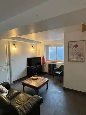 Télévision ou salle de divertissement dans l'établissement Maison Alfred