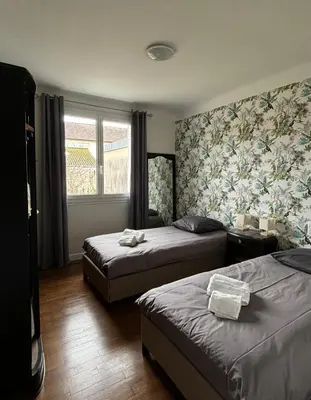 Un ou plusieurs lits dans un hébergement de l'établissement Maison Alfred