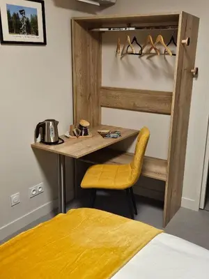 Un ou plusieurs lits dans un hébergement de l'établissement Auberge du Prieuré