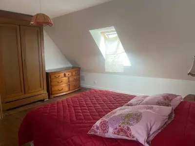 Un ou plusieurs lits dans un hébergement de l'établissement La Maison bleue
