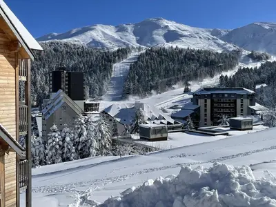 L'établissement Coquet studio avec terrasse au Lioran, animaux admis - FR-1-787-119 en hiver