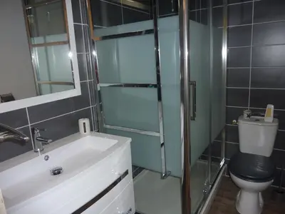 Salle de bains dans l'établissement Appartement pied des pistes