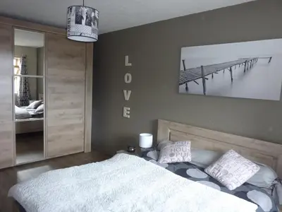 Un ou plusieurs lits dans un hébergement de l'établissement Appartement pied des pistes