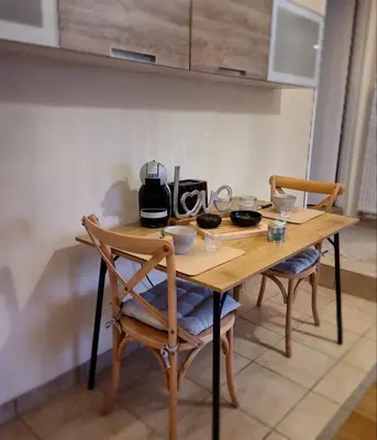 Cuisine ou kitchenette dans l'établissement SensAura