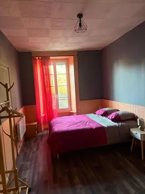 Un ou plusieurs lits dans un hébergement de l'établissement La Flânerie Mauriacoise