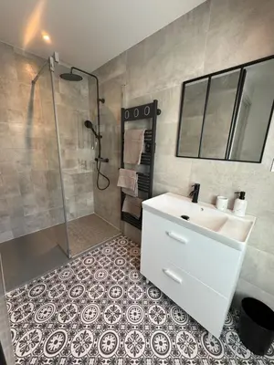 Salle de bains dans l'établissement La grange du pouget