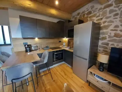 Cuisine ou kitchenette dans l'établissement La Parenthèse Romane