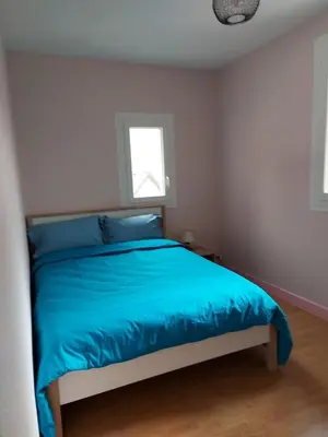 Un ou plusieurs lits dans un hébergement de l'établissement Maison au pied du puy mary