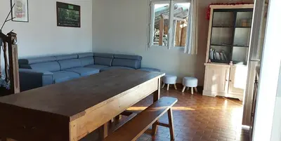 Coin salon dans l'établissement Maison au pied du puy mary