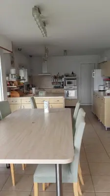 Cuisine ou kitchenette dans l'établissement Détente