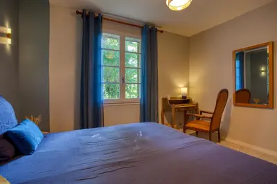 Un ou plusieurs lits dans un hébergement de l'établissement Maison 3 ch calme, jardin, Le nid des Chênes