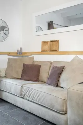 Coin salon dans l'établissement House With View In The Heart Of Auvergne