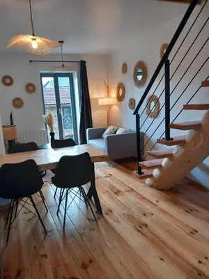 Coin salon dans l'établissement Le duplex Cornadore