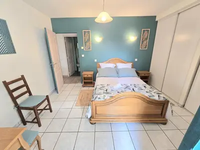 Un ou plusieurs lits dans un hébergement de l'établissement Gîte de charme avec cheminée en Dordogne - FR-1-616-466