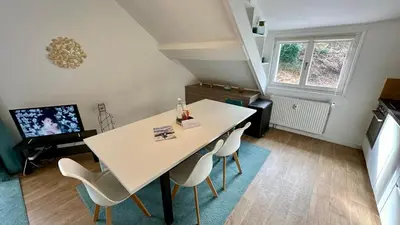 Télévision ou salle de divertissement dans l'établissement Villa Pax 4 - La Bourboule 6 personnes