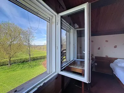 Un ou plusieurs lits dans un hébergement de l'établissement Chez Maurice Maison familiale & Campagne