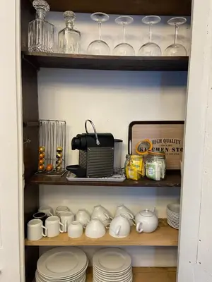 Cuisine ou kitchenette dans l'établissement La Suite Historique au Coeur d'Ussel