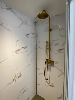 Salle de bains dans l'établissement La Suite Historique au Coeur d'Ussel