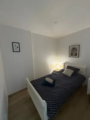 Un ou plusieurs lits dans un hébergement de l'établissement La Villa Louana 4 Appartement neuf et moderne tout confort
