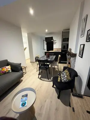 Coin salon dans l'établissement La Villa Louana 4 Appartement neuf et moderne tout confort