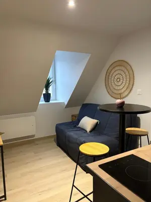 Coin salon dans l'établissement Le studio louana Appartement neuf et discret tout confort