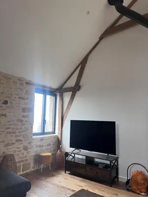 Télévision ou salle de divertissement dans l'établissement la ferme des treilles