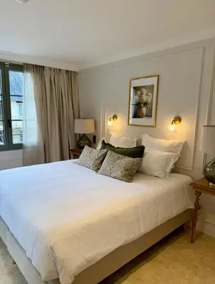 Un ou plusieurs lits dans un hébergement de l'établissement Hôtel Maison Turenne