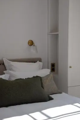 Un ou plusieurs lits dans un hébergement de l'établissement Hôtel Maison Turenne