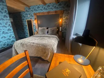 Un ou plusieurs lits dans un hébergement de l'établissement Auberge du lac de Guéry